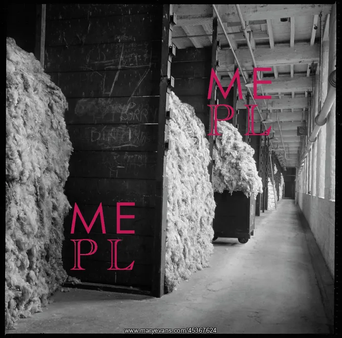 : Bay stacked with raw wool awaiting processing in Salt's Mill : Bay stacked with raw wool awaiting processing in Salt's Mill