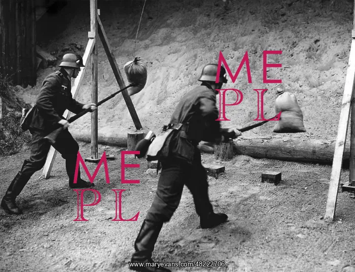 : Bayonet training on sandbag, 1938 : Bayonet training on sandbag, 1938