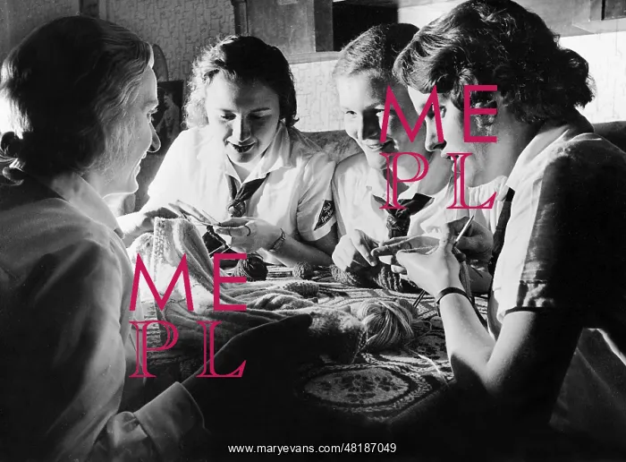 : BDM girls while collective needlework : BDM girls while collective needlework