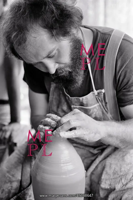 : Bearded Craftsman Potter Throwing Piece of Pottery : Bearded Craftsman Potter Throwing Piece of Pottery