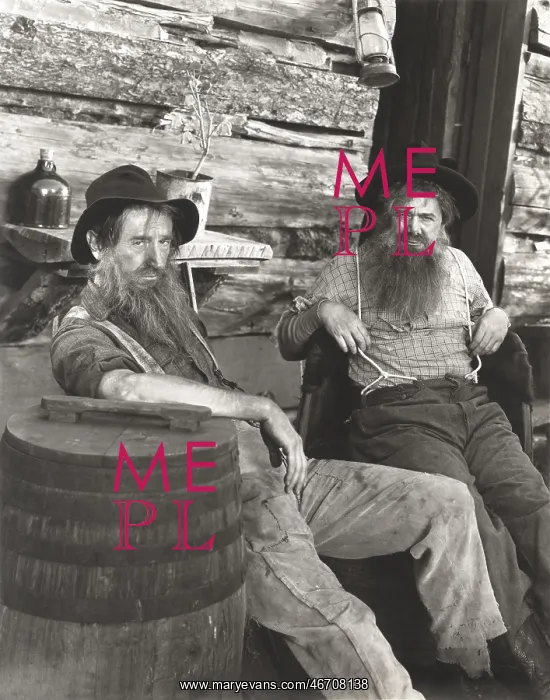 : Two bearded men lounging : Two bearded men lounging