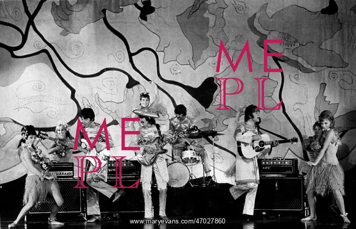 : The Beatles performing with dancing girls : The Beatles performing with dancing girls