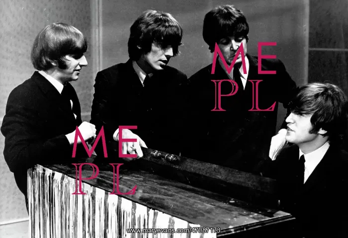: The Beatles pop group, gathered round a piano : The Beatles pop group, gathered round a piano