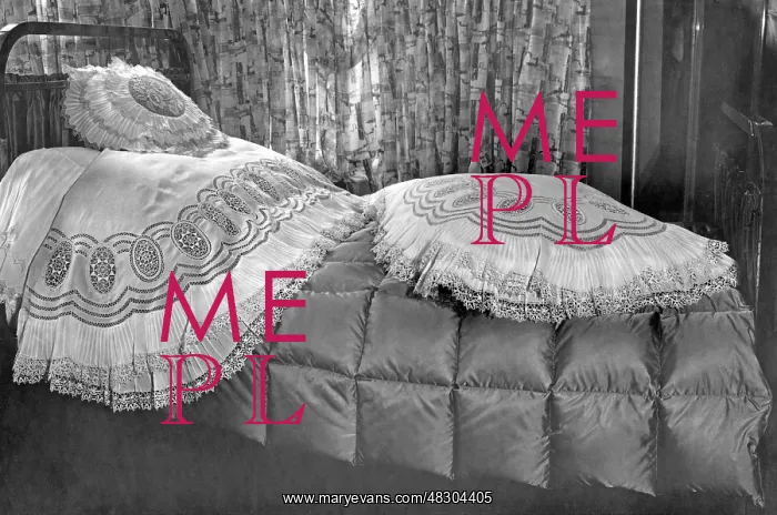 : Bed, 1928. Bed with blankets and pillows made of Valenciennes lace : Bed, 1928. Bed with blankets and pillows made of Valenciennes lace