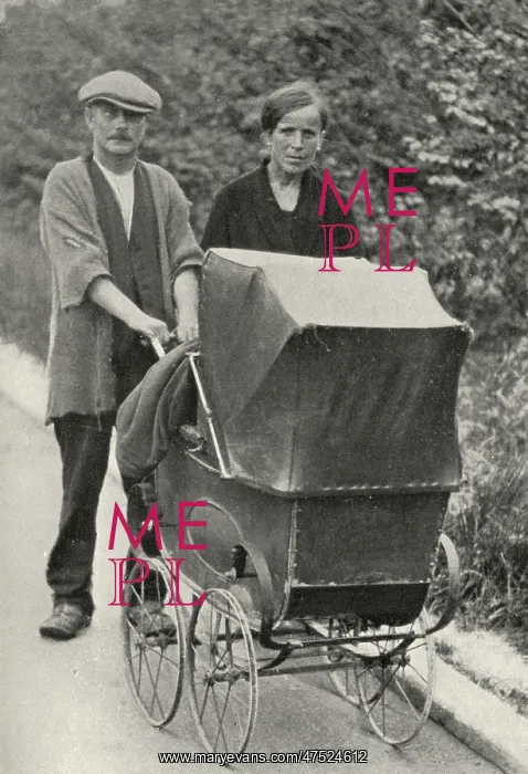 : Beggar couple with child in pram : Beggar couple with child in pram