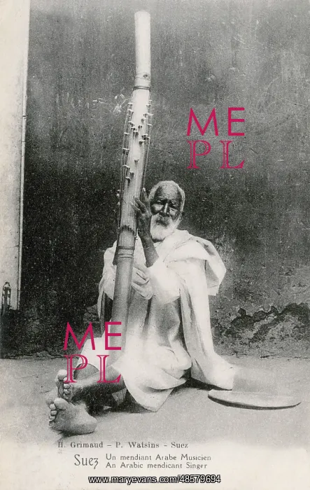 : A begging musician in Suez, Egypt : A begging musician in Suez, Egypt