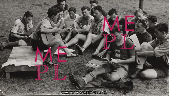 : Belgian or French boy scouts singing at camp : Belgian or French boy scouts singing at camp