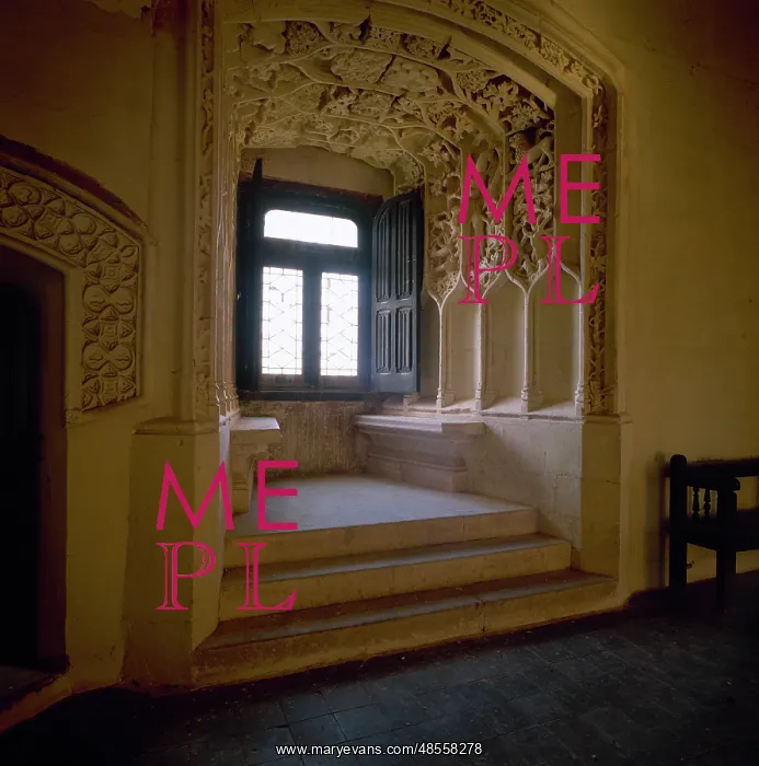 : Belmonte castle. A Plateresque window with decoration. La Ma : Belmonte castle. A Plateresque window with decoration. La Ma