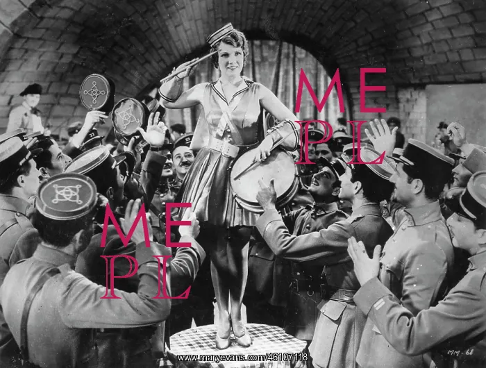 : Bernice Claire in a scene with legionnaires : Bernice Claire in a scene with legionnaires