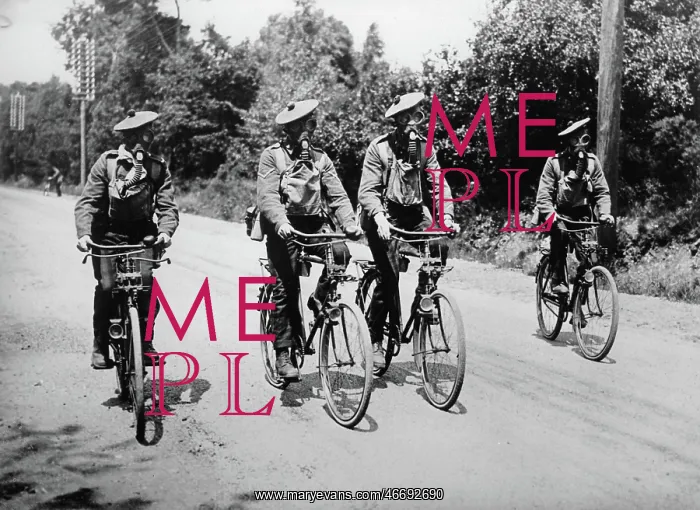 : A bicycle patrol equipped with gas : A bicycle patrol equipped with gas