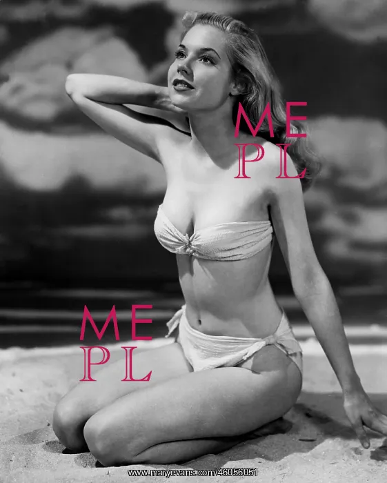 : A bikini-clad woman : A bikini-clad woman