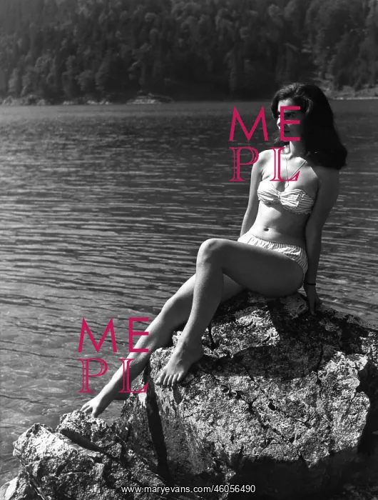 : A bikini-clad woman : A bikini-clad woman