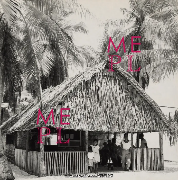 : Bikini Islanders in their thatched roof home, ca : Bikini Islanders in their thatched roof home, ca