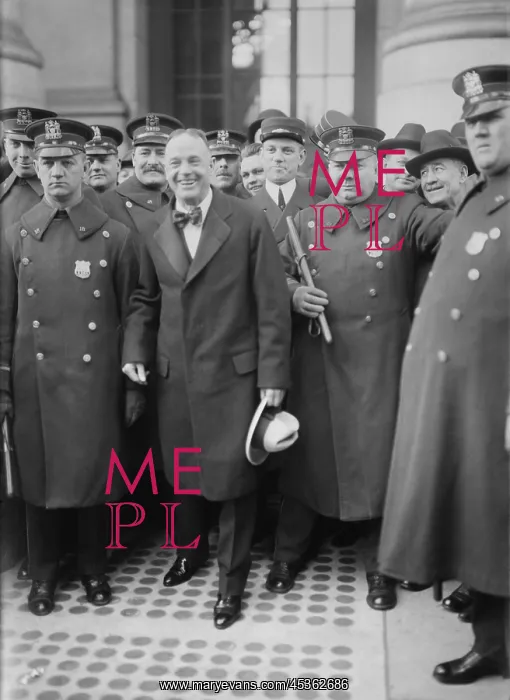 : Billy Sunday surrounded by police on his arrival : Billy Sunday surrounded by police on his arrival