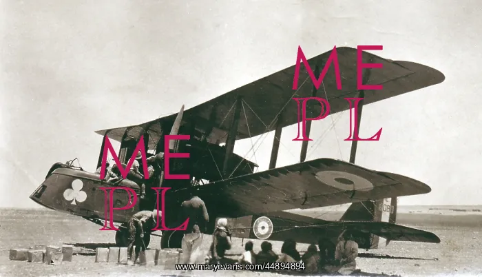 : Biplane bomber with crew and arabs in the desert, Iraq : Biplane bomber with crew and arabs in the desert, Iraq