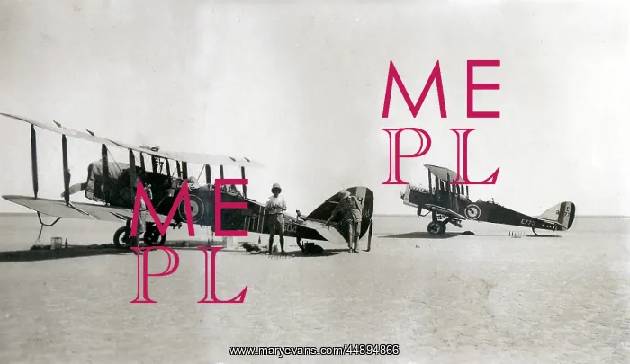 : Two biplanes with resting crew, Iraq : Two biplanes with resting crew, Iraq