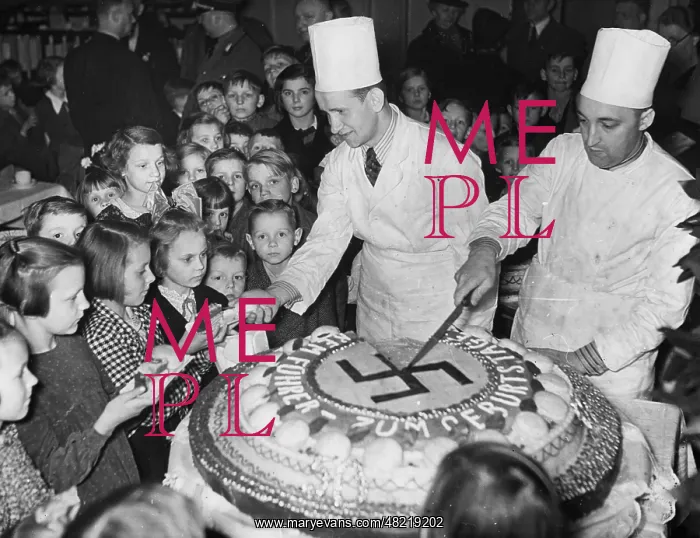 : The birthday cake of Adolf Hitler is shared with childre : The birthday cake of Adolf Hitler is shared with childre