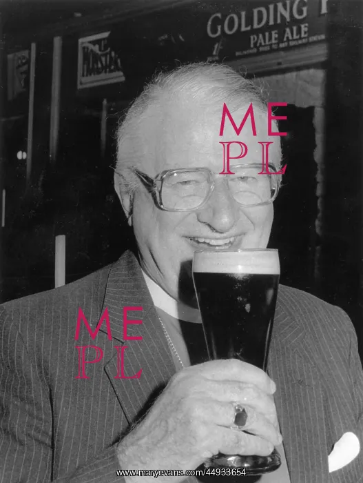 : Bishop of Truro enjoying a pint of beer, Redruth, Cornwall : Bishop of Truro enjoying a pint of beer, Redruth, Cornwall