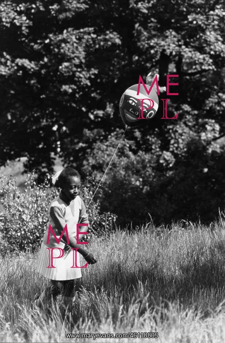 : Black girl with a balloon in a park : Black girl with a balloon in a park