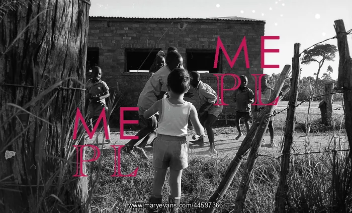 : Black and white photo of children playing on cattle : Black and white photo of children playing on cattle