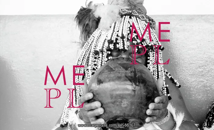 : Black and white photo of sangoma drinking from : Black and white photo of sangoma drinking from
