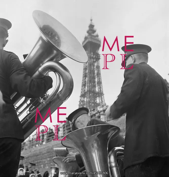 : Blackpool. A close up of two Salvation Army bandsmen playing tubas on the : Blackpool. A close up of two Salvation Army bandsmen playing tubas on the