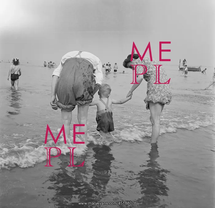 : Blackpool. A man and woman encouraging a young child to paddle in the sea at Blackpool : Blackpool. A man and woman encouraging a young child to paddle in the sea at Blackpool