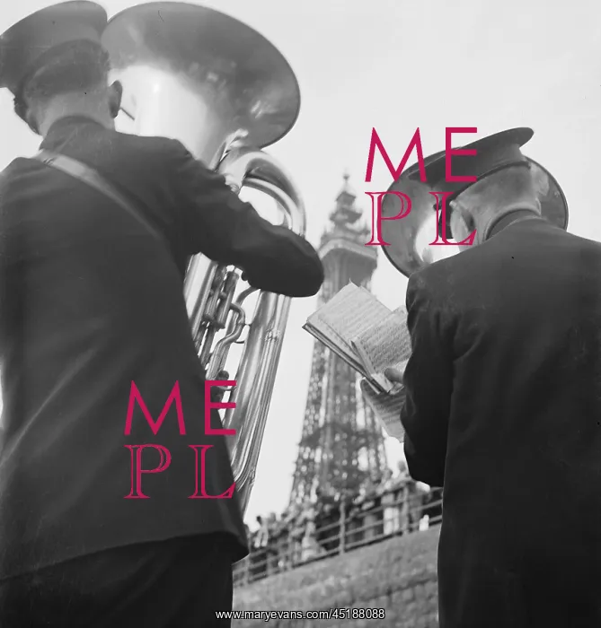 : Blackpool. A close up of two Salvation Army bandsmen playing tubas on the : Blackpool. A close up of two Salvation Army bandsmen playing tubas on the