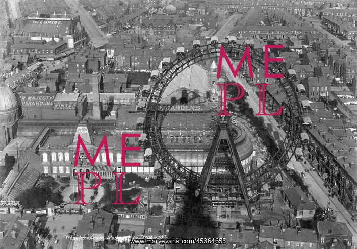: Blackpool Winter Gardens and Big Wheel. A view over the rooftops looking : Blackpool Winter Gardens and Big Wheel. A view over the rooftops looking