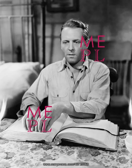 : Blind man reading book in Braille : Blind man reading book in Braille