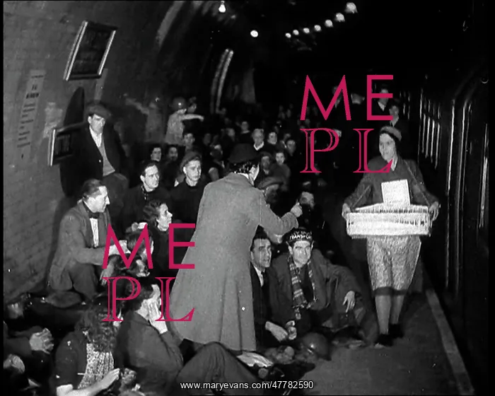 : The Blitz. Civilians Receiving Supplies While Sheltering From Bombs in : The Blitz. Civilians Receiving Supplies While Sheltering From Bombs in