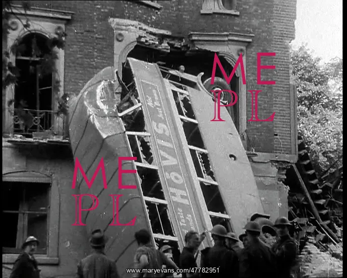 : The Blitz. People Standing Next to a Bombed Out Bus - London, United Kingdom : The Blitz. People Standing Next to a Bombed Out Bus - London, United Kingdom