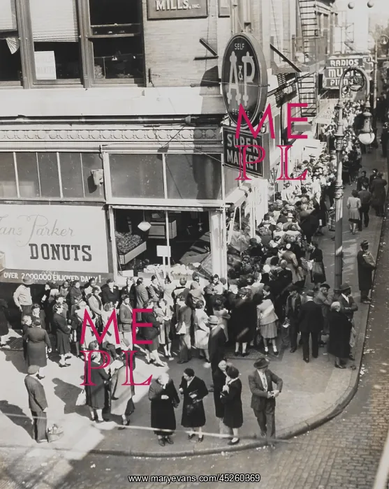 : A block long crowd waiting for the opening of : A block long crowd waiting for the opening of