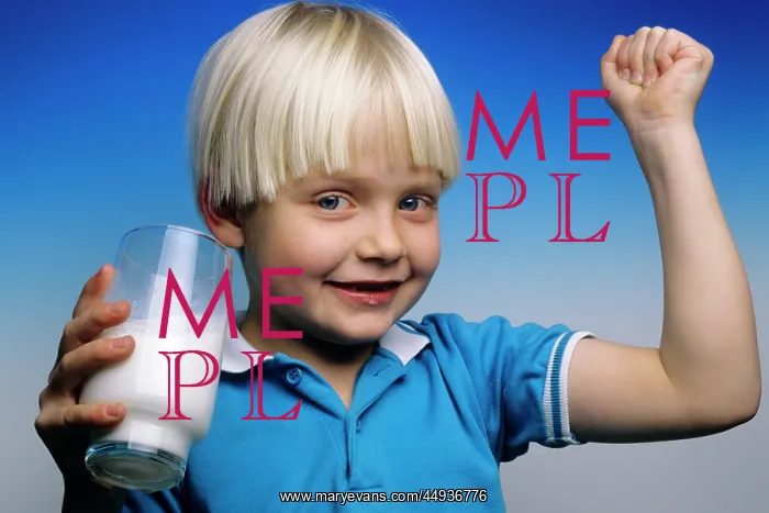 : Blond Boy Holding a Glass of Milk and Making a : Blond Boy Holding a Glass of Milk and Making a