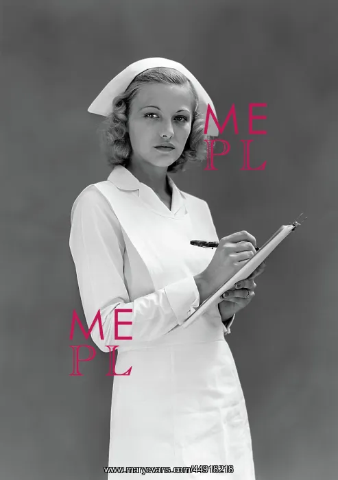 : Serious blond woman nurse in white cap and uniform : Serious blond woman nurse in white cap and uniform