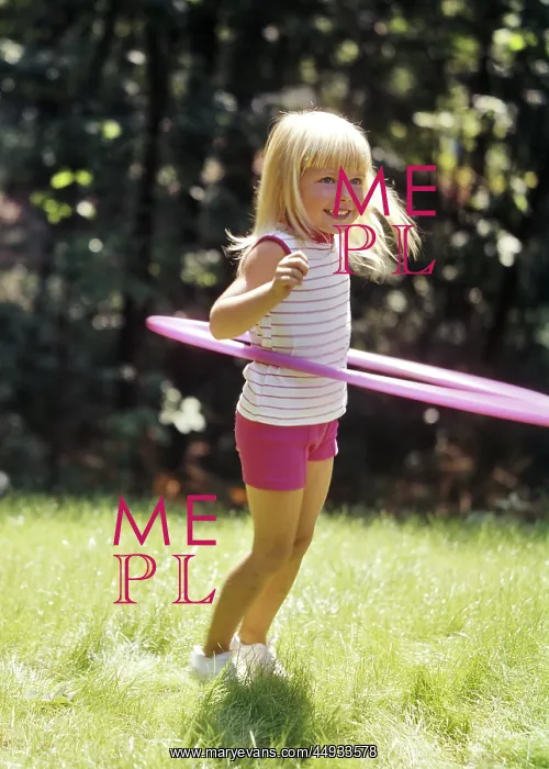 : Blonde Girl playing with a Hulahoop : Blonde Girl playing with a Hulahoop