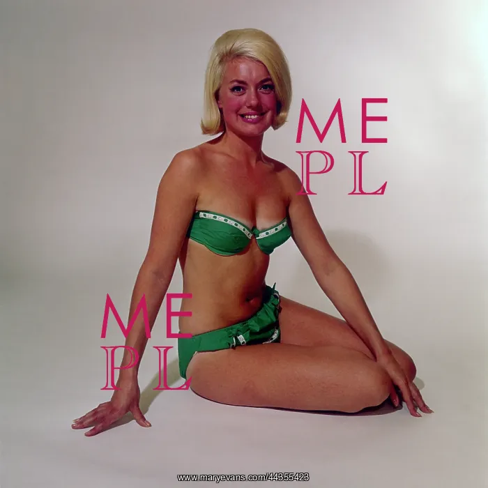  : Blonde model in green and white bikini
