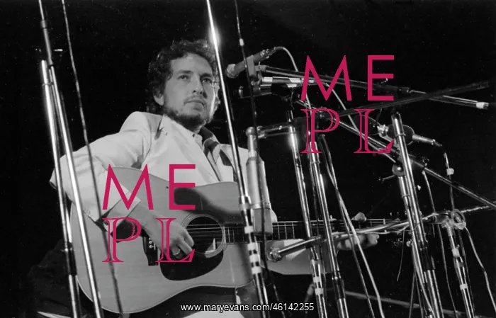 : Bob Dylan performing at a Music Festival : Bob Dylan performing at a Music Festival