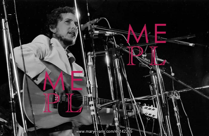 : Bob Dylan performing at a Music Festival : Bob Dylan performing at a Music Festival