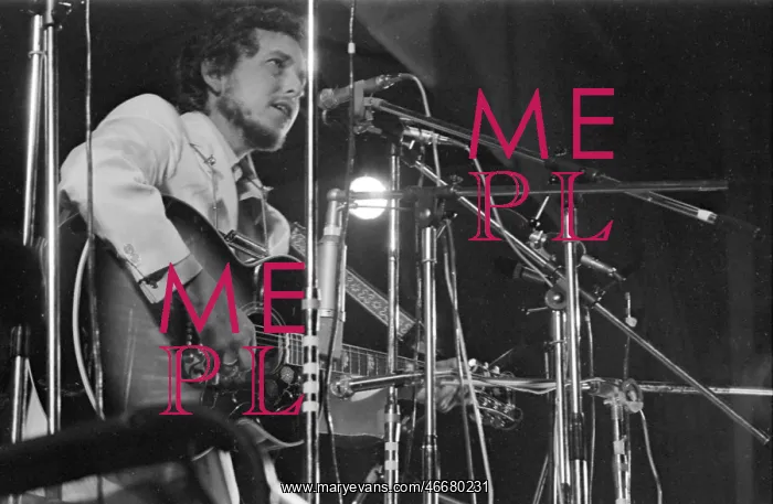 : Bob Dylan performing at a Music Festival : Bob Dylan performing at a Music Festival