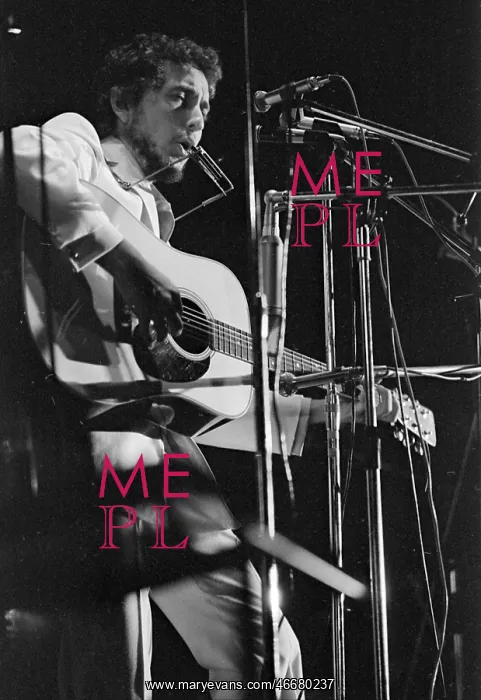 : Bob Dylan performing at a Music Festival : Bob Dylan performing at a Music Festival