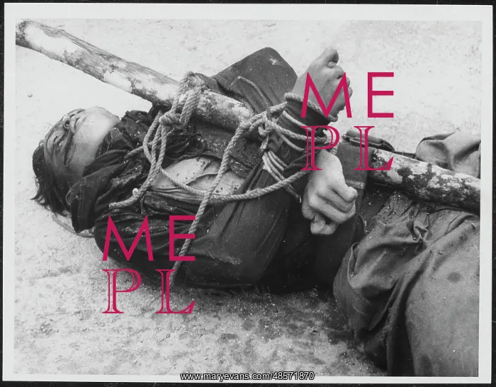 : Body of a Malayan Terrorist trussed to a stake : Body of a Malayan Terrorist trussed to a stake