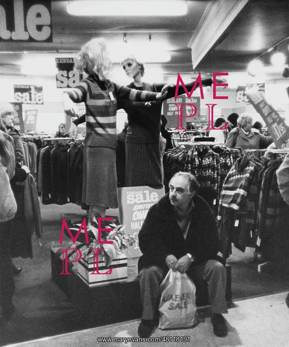 : Bored-looking man at the sales : Bored-looking man at the sales