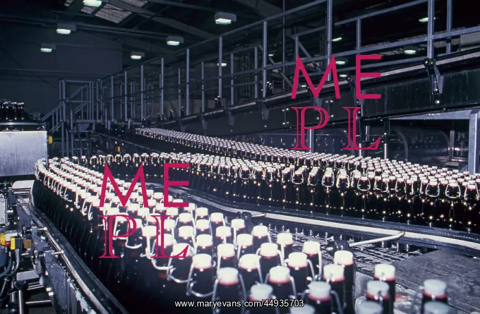  : Bottled drink being produced in a factory