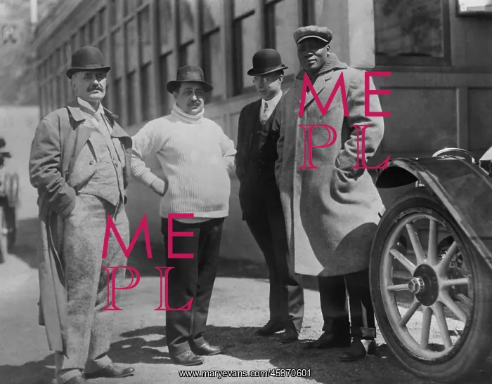 : Boxer Jack Johnson (far right) and his manager : Boxer Jack Johnson (far right) and his manager