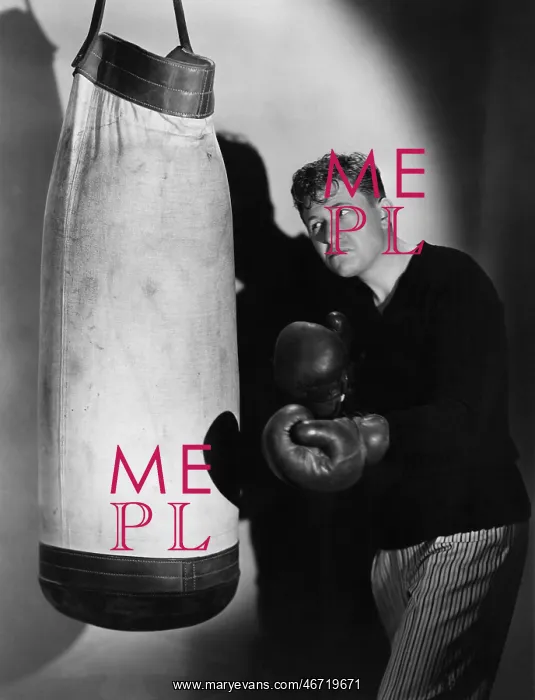 : Boxer using punching bag : Boxer using punching bag