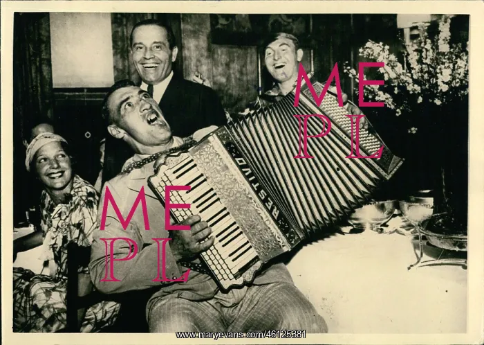 : Boxing. Jul. 12, 1933 - Italian boxer Sharkey with his accordian : Boxing. Jul. 12, 1933 - Italian boxer Sharkey with his accordian