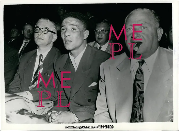 : Boxing. Sep. 09, 1953 - Randy Turpin and Jack Solomons watch Marciano beat : Boxing. Sep. 09, 1953 - Randy Turpin and Jack Solomons watch Marciano beat
