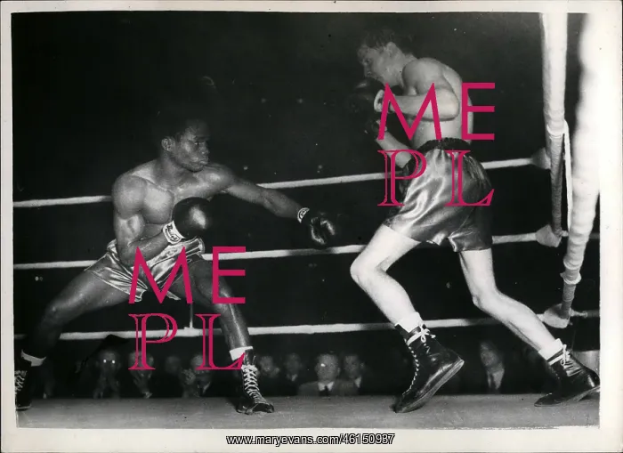 : Boxing. Oct. 10, 1953 - McCarthy loses at last beaten by Nigerian at Royal Albert hall. : Boxing. Oct. 10, 1953 - McCarthy loses at last beaten by Nigerian at Royal Albert hall.