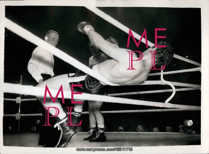 : Boxing. Mar. 03, 1956 - Ron Barton goes through the ropes - but wins fight : Boxing. Mar. 03, 1956 - Ron Barton goes through the ropes - but wins fight